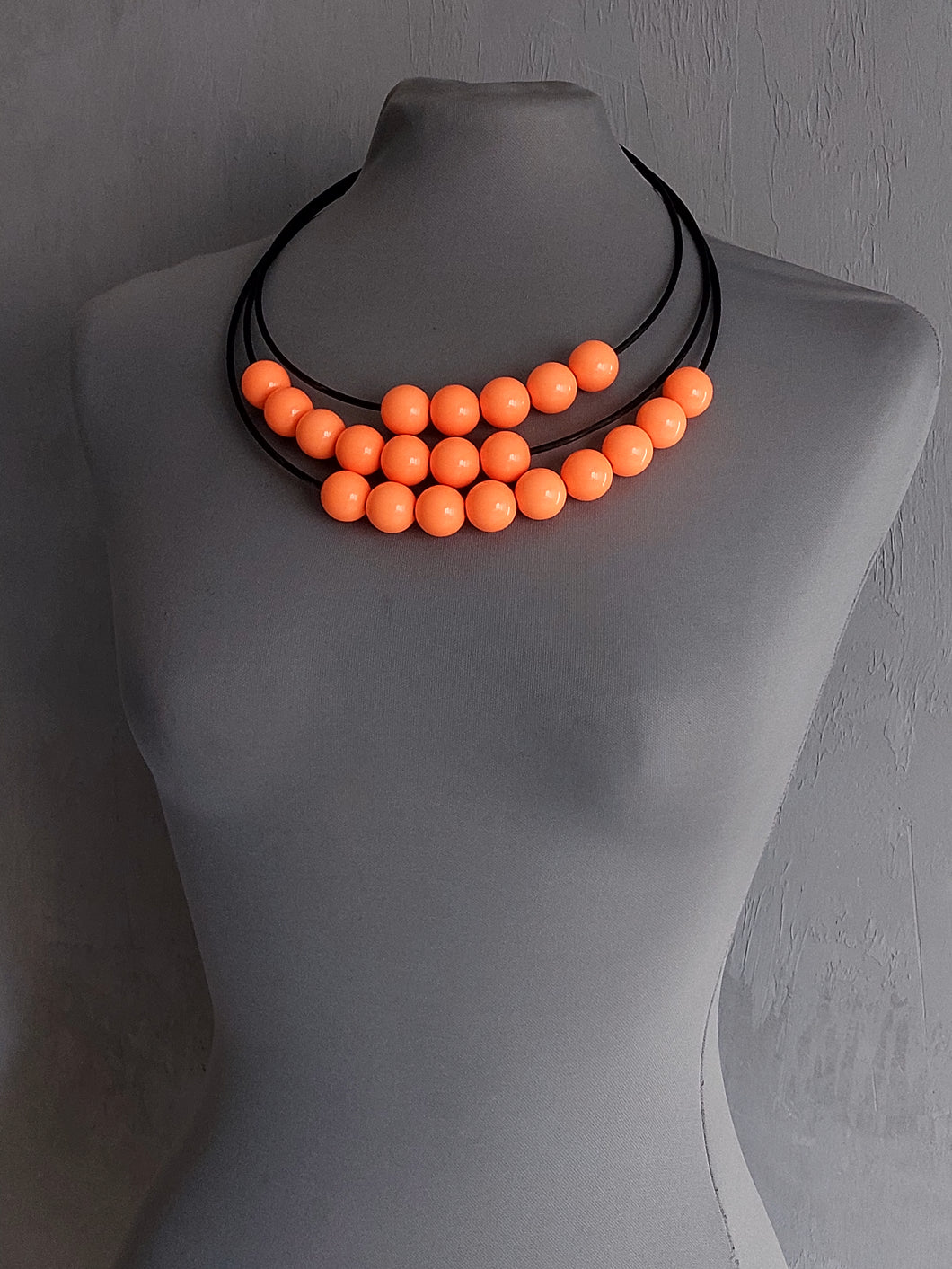 Collana Saturnino arancio fluo